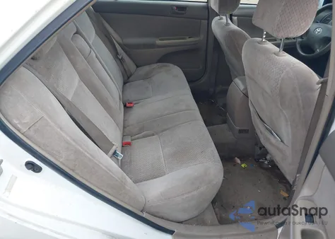 2003 Toyota Camry Le from USA, damaged, VIN 4T1BE32K33U219697